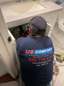 A us comfort electrician working